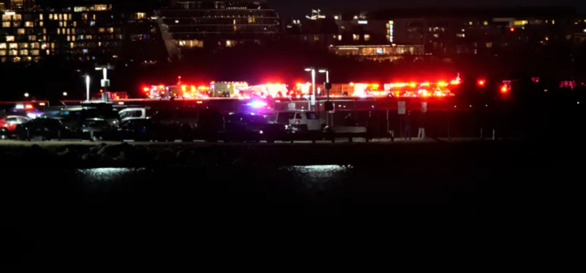 Plane carrying more than 60 collides with helicopter, crashes in ...