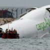Two dead after cargo plane skids off Hong Kong runway into sea