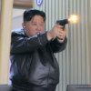 North Korean leader Kim and his daughter try out new pistols at shooting range