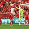 Canada and Switzerland reach knockout stage, Qatar eliminated