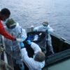 Rescuers pull more bodies from burned Philippine ferry as death toll hits 76