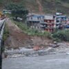 Flood-triggered damage to bridge halts transportation; tourism and trade affected